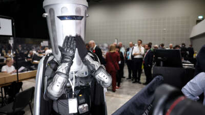 Count Binface of the Count Binface Party speaks to the media at the by-election declaration at The Edge where votes were being counted on June 19, 2026, in Wigan, England.