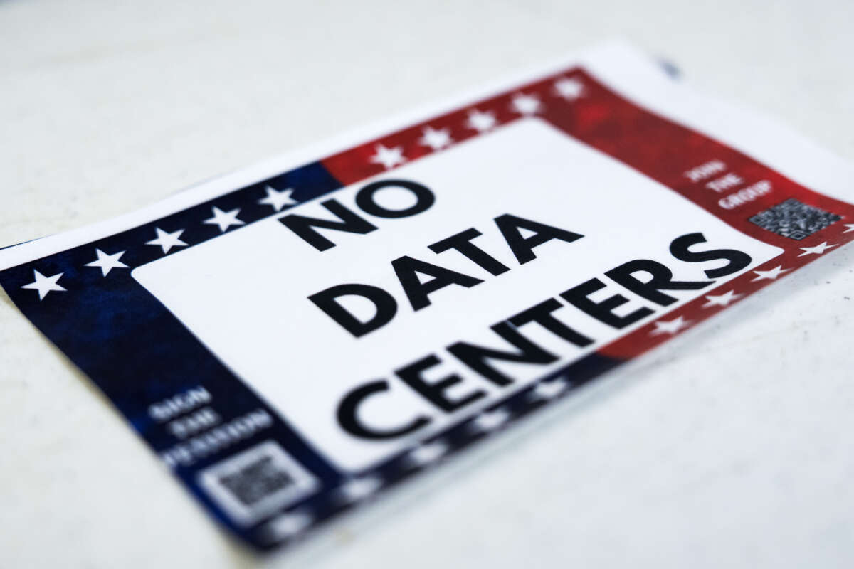 A sticker against data centers is seen during a forum hosted by Matagorda County Against Data Centers on the impact of data center construction, in Bay City, Texas, on June 11, 2026.