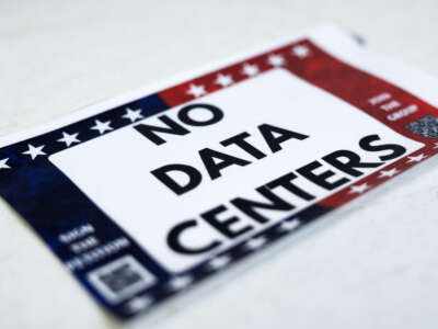 A sticker against data centers is seen during a forum hosted by Matagorda County Against Data Centers on the impact of data center construction, in Bay City, Texas, on June 11, 2026.