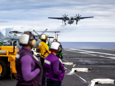 A C-2A Greyhound comes in for a landing aboard Nimitz-class aircraft carrier USS Nimitz on June 25, 2026, off the coast of North Carolina in the Atlantic Ocean.