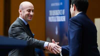 White House Deputy Chief of Staff Stephen Miller shakes hands with Secretary of State Marco Rubio before addressing the audience during opening remarks at the “Ministerial on the Resurgence of Political Terrorism” at the U.S. State Department, on July 16, 2026, in Washington, D.C.