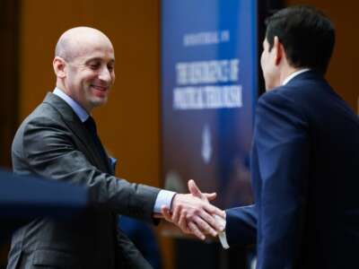 White House Deputy Chief of Staff Stephen Miller shakes hands with Secretary of State Marco Rubio before addressing the audience during opening remarks at the “Ministerial on the Resurgence of Political Terrorism” at the U.S. State Department, on July 16, 2026, in Washington, D.C.