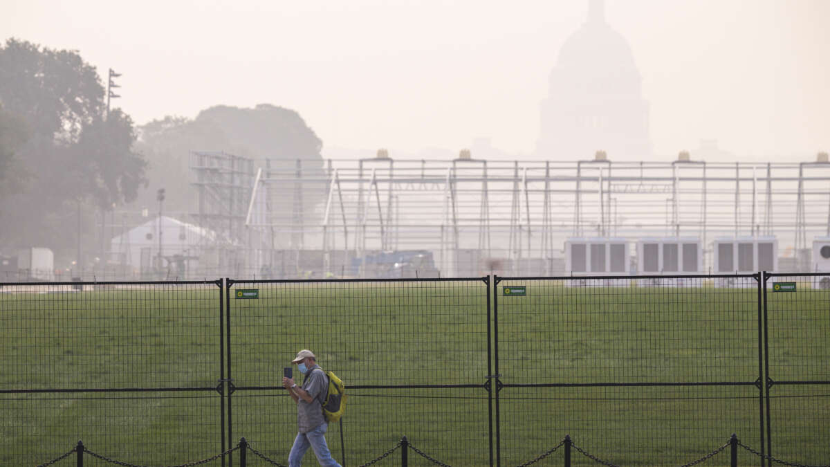 Smoke from massive wildfires in Canada and Minnesota engulfs the Washington, D.C. skyline, reducing visibility and casting a colored haze over the U.S. Capitol Building on July 17, 2026, in Washington, D.C.