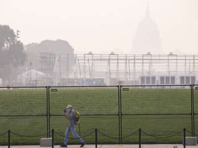 Smoke from massive wildfires in Canada and Minnesota engulfs the Washington, D.C. skyline, reducing visibility and casting a colored haze over the U.S. Capitol Building on July 17, 2026, in Washington, D.C.