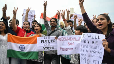 Students celebrate the resignation of India's Education Minister Dharmendra Pradhan, in Amritsar, India, on July 25, 2026, amid an ongoing protest by the Cockroach Janta Party (CJP) at New Delhi's jantar Mantar over alleged NEET examination irregularities. India's Education Minister Dharmendra Pradhan resigned on Saturday after mass youth-led protests demanded his ouster in anger over a string of irregularities in potentially life-changing exams.