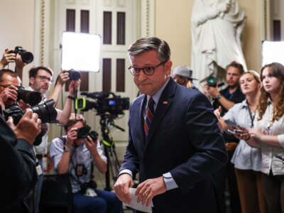 Speaker of the House Mike Johnson departs after speaking to the press in the U.S. Capitol on July 22, 2026, in Washington, D.C.