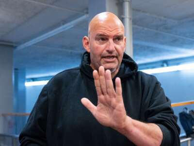 Sen. John Fetterman speaks to reporters as he arrives in the U.S. Capitol for a vote on Thursday, July 16, 2026.