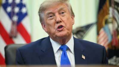 President Donald Trump speaks before signing an executive order calling for more research and flexibility on vaccines, in the Oval Office of the White House in Washington, DC, on August 10, 2026.