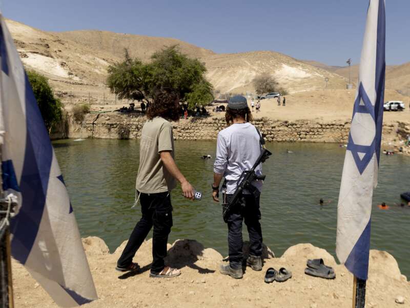 Israelis hang out at the ancient archaeological site known as Herod's Pool on July 31, 2026 near the Israeli settlement of Petza'el, West Bank.