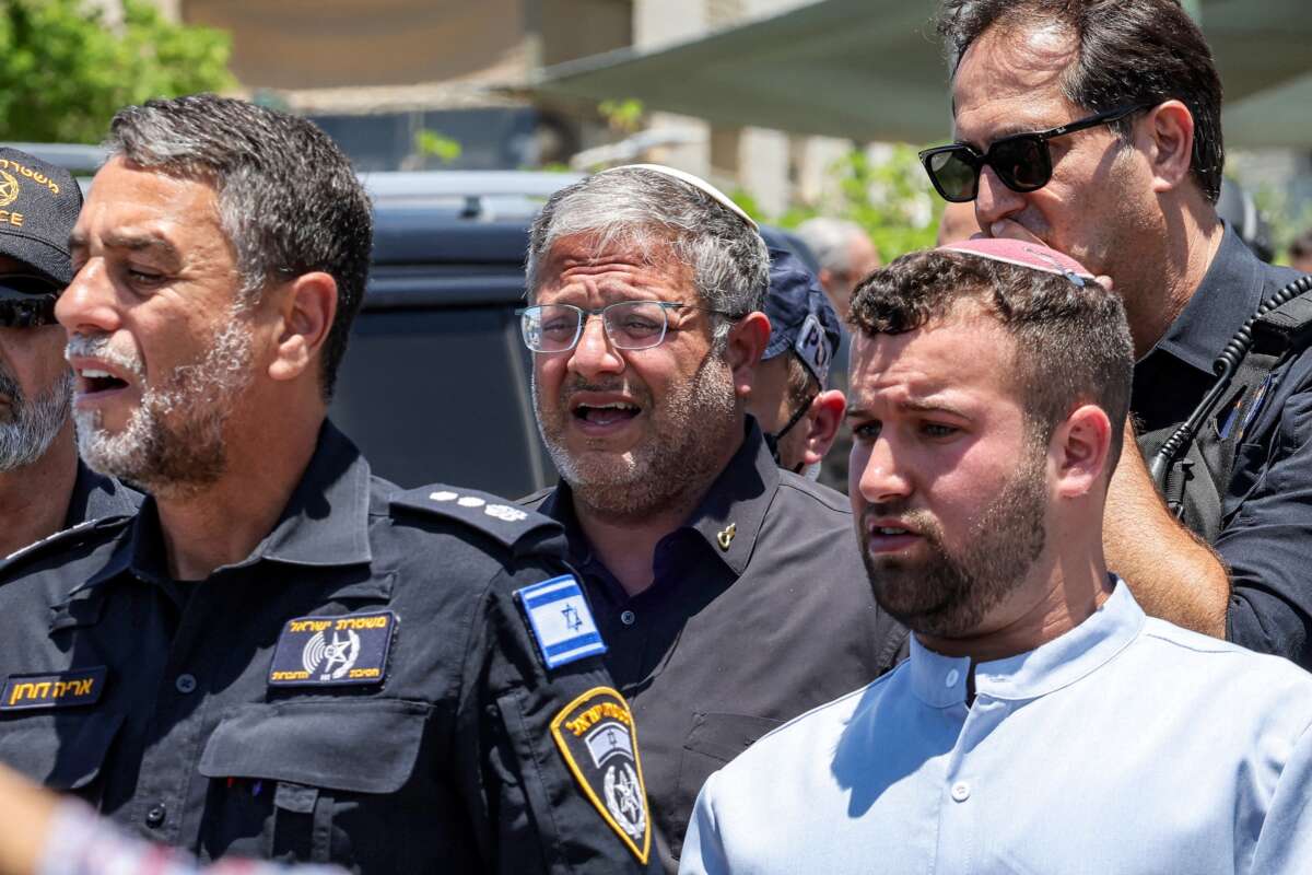 Israel's far-right national security minister Itamar Ben Gvir (C) arrives at the site of a suspected shooting attack in the town of Tzur Yitzhak in central Israel close to the occupied West Bank on June 7, 2026.