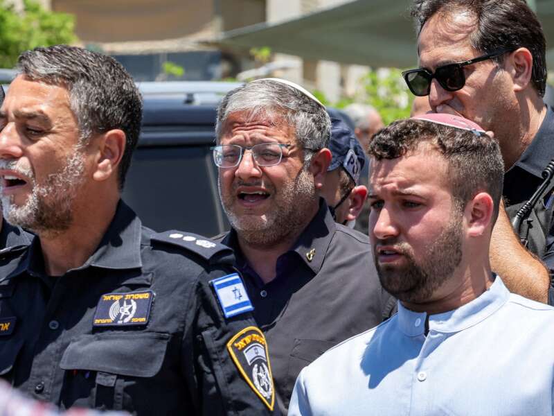 Israel's far-right national security minister Itamar Ben Gvir (C) arrives at the site of a suspected shooting attack in the town of Tzur Yitzhak in central Israel close to the occupied West Bank on June 7, 2026.