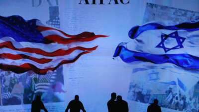 Workers prepare the stage before for Israeli Prime Minister Benjamin Netanyahu address to the American Israel Public Affairs Committee (AIPAC) 2015 Policy Conference, March 2, 2015 in Washington, D.C.