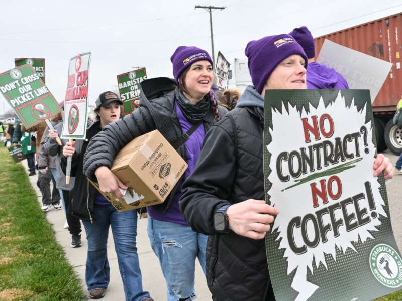 Starbucks Workers United baristas and supporters close off road and rally for a fair union contract outside Starbucks East Coast distribution center on November 19, 2025, in York, Pennsylvania.