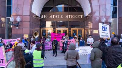 Activists protest New York State Comptroller Thomas DiNapoli's purchasing of Israel Bonds in Albany, New York, on October 16, 2025.