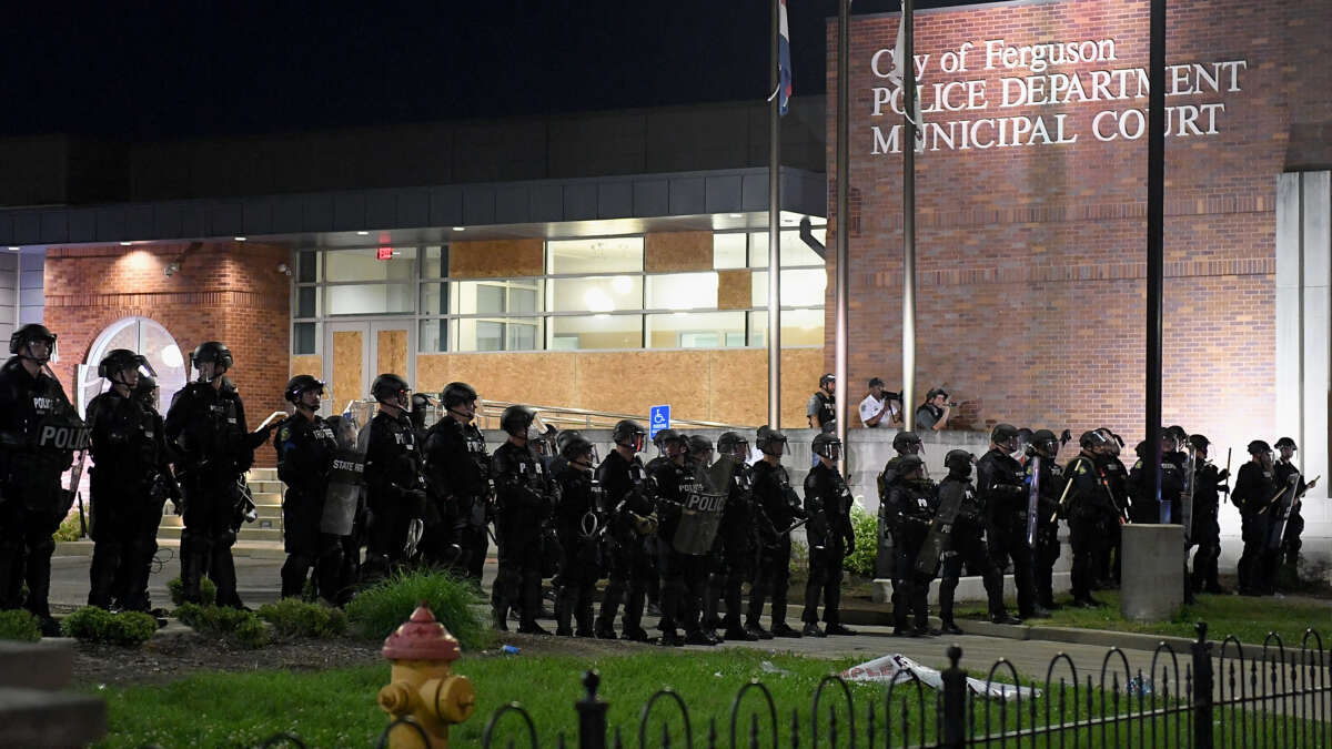 Law enforcement officers are seen during a protest at the Ferguson Police Department on May 31, 2020, in Ferguson, Missouri.
