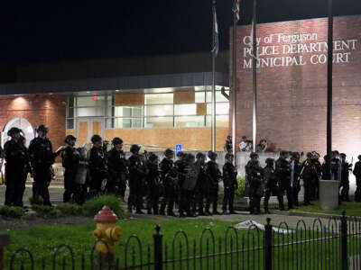 Law enforcement officers are seen during a protest at the Ferguson Police Department on May 31, 2020, in Ferguson, Missouri.