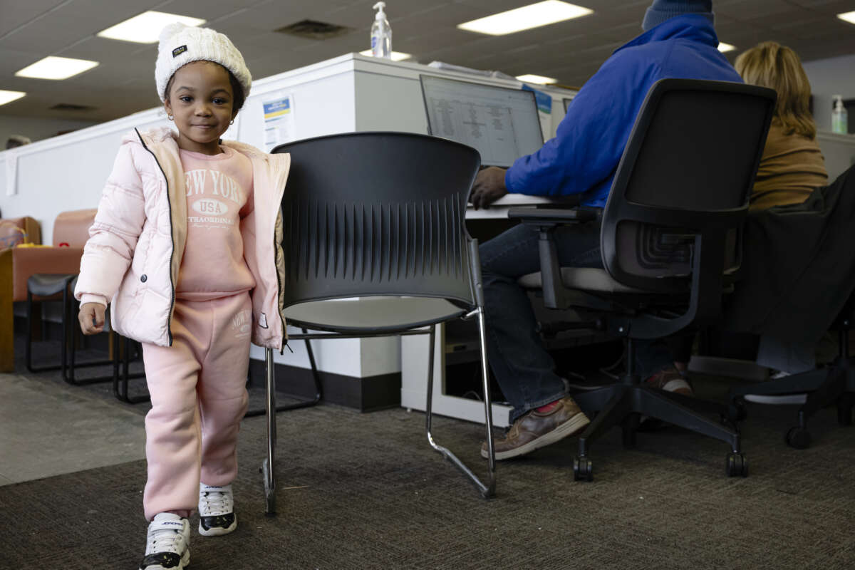 A girl looks on at St. Vincent de Paul Society, an organization that provides aid to Haitian immigrants, on February 3, 2026. in Springfield, Ohio.