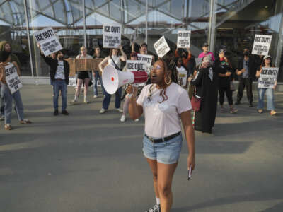 Demonstrators protest against ICE at Atlanta Hartsfield-Jackson International Airport on March 23, 2026, in Atlanta, Georgia.