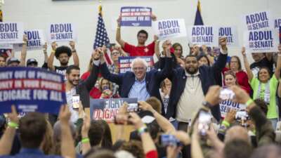 Senator Bernie Sanders held a rally at a Detroit high school as part of his 'Fighting Oligarchy' campaign. With Sanders are U.S. Senate candidate Dr. Abdul El-Sayed (left) and state representative Donavan McKinney, who is running for a Congressional seat.