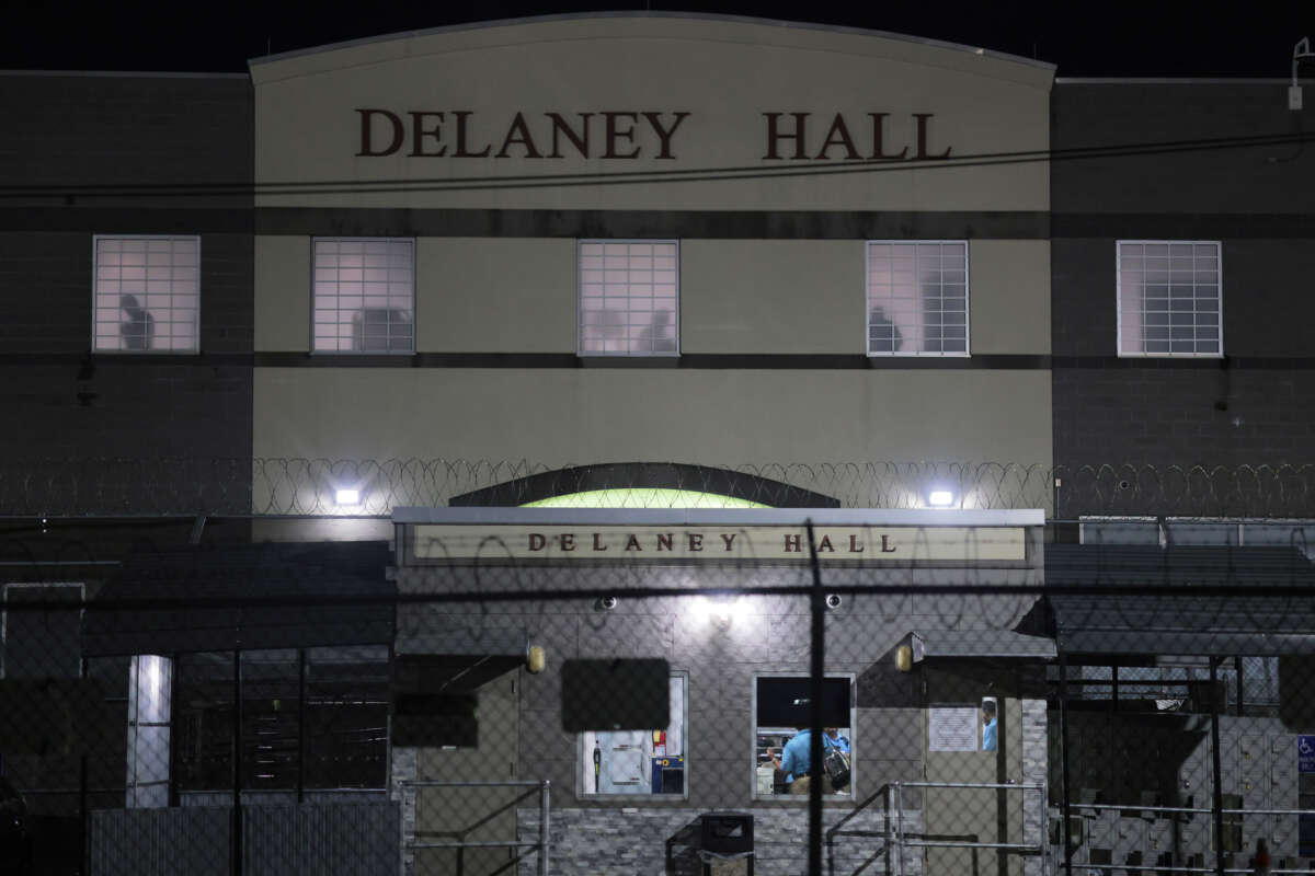 The silhouettes of detainees are seen at the Delaney Hall Immigration Detention Center on June 12, 2026, in Newark, New Jersey.