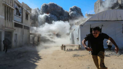 Smoke from an explosion can be seen after an Israeli attack on July 12, 2026, in Gaza City, Gaza.