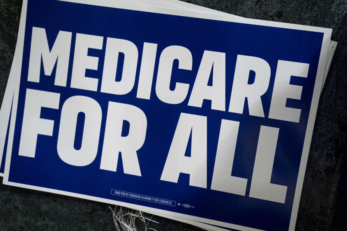 A Medicare for All sign is displayed before Michigan Democratic candidate for Senate Abdul El-Sayed speaks at The People V. The Powerful rally at the Detroit Opera House on July 18, 2026, in Detroit, Michigan.