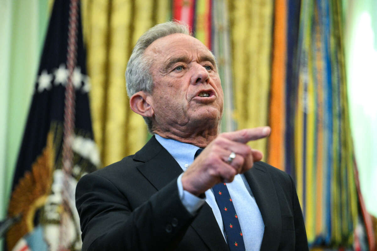 U.S. Secretary of Health and Human Services Robert F. Kennedy Jr. speaks before President Donald Trump signs an executive order scaling back vaccine mandates, in the Oval Office of the White House in Washington, D.C., on August 10, 2026.