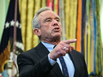 U.S. Secretary of Health and Human Services Robert F. Kennedy Jr. speaks before President Donald Trump signs an executive order scaling back vaccine mandates, in the Oval Office of the White House in Washington, D.C., on August 10, 2026.