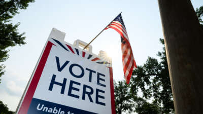 Signage directs voters at a polling place in the Tamarack Nature Center on August 11, 2026, in White Bear Township, Minnesota.