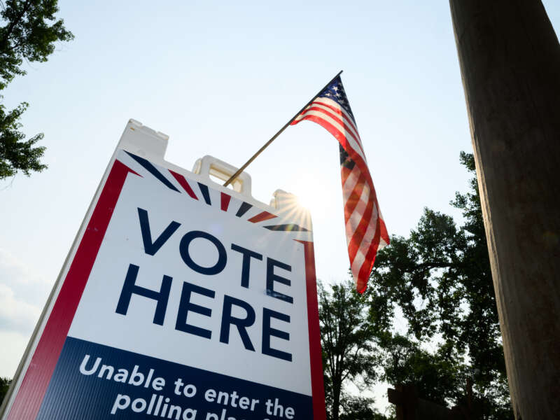 Signage directs voters at a polling place in the Tamarack Nature Center on August 11, 2026, in White Bear Township, Minnesota.