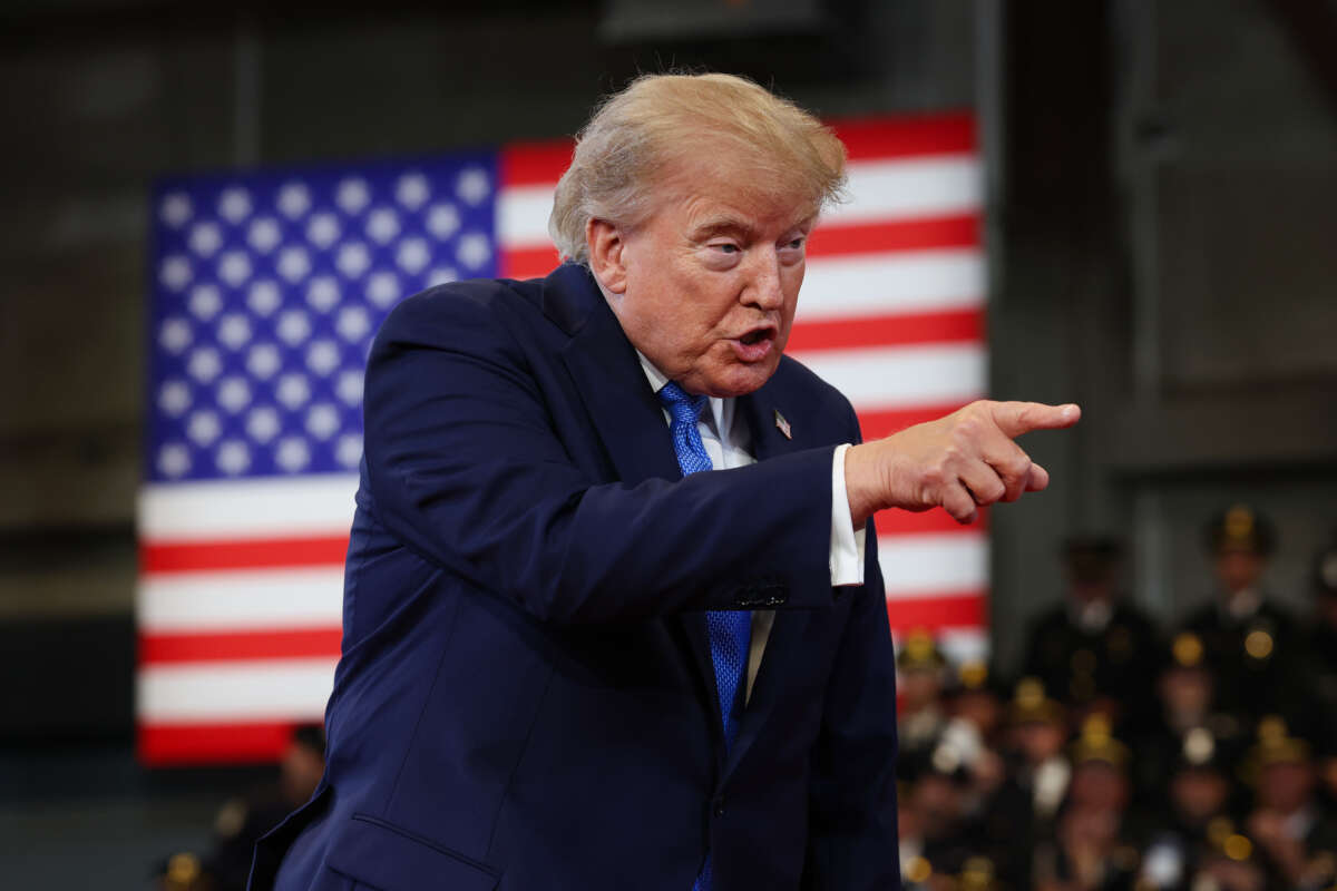 U.S. President Donald Trump arrives to deliver remarks at the David S. Mack Center for Training and Intelligence on August 14, 2026, in Garden City, New York.