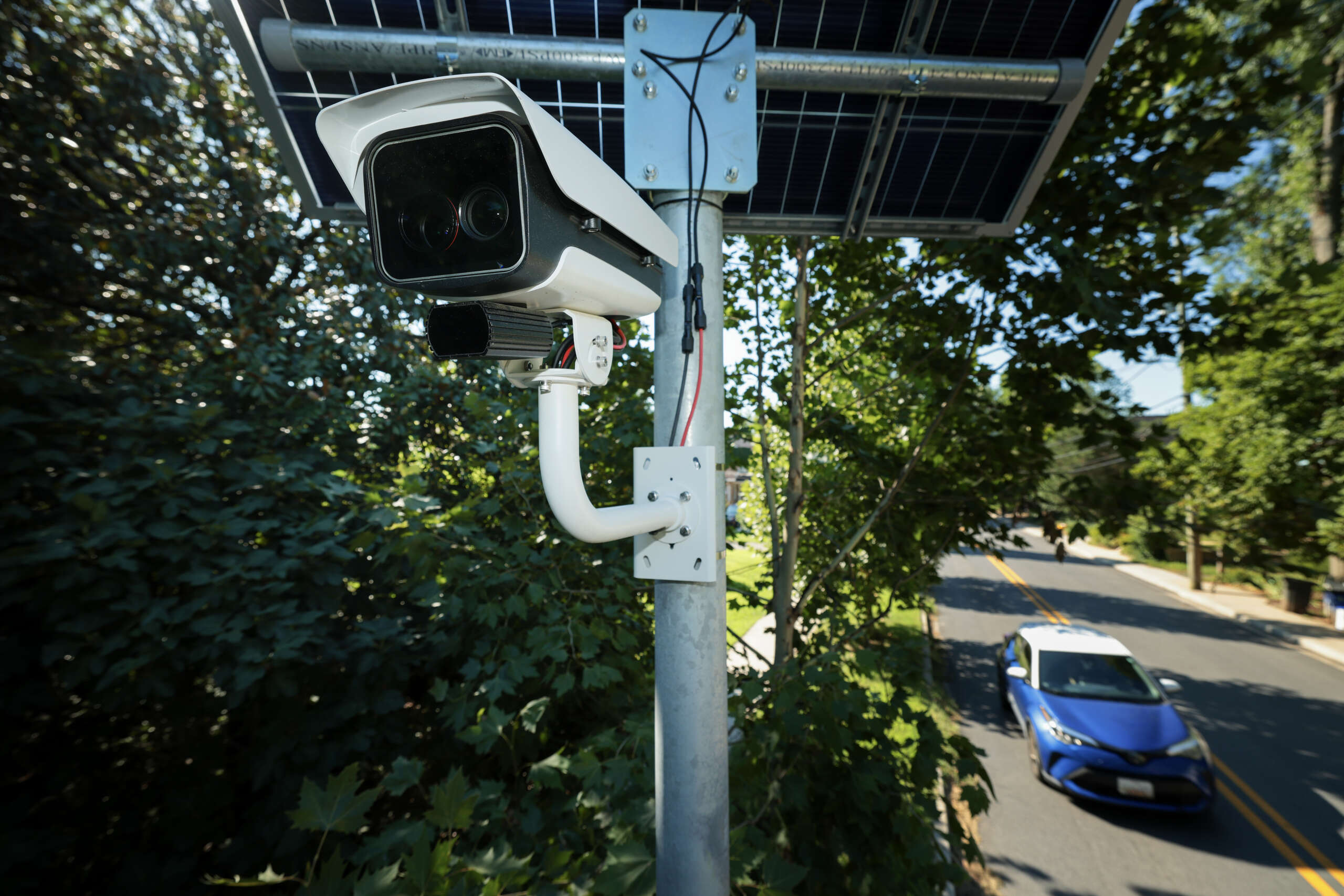 An automatic license plate reader (ALPR) camera monitors traffic at the intersection of Flower and Houston avenues on August 19, 2026 in Silver Spring, Maryland.