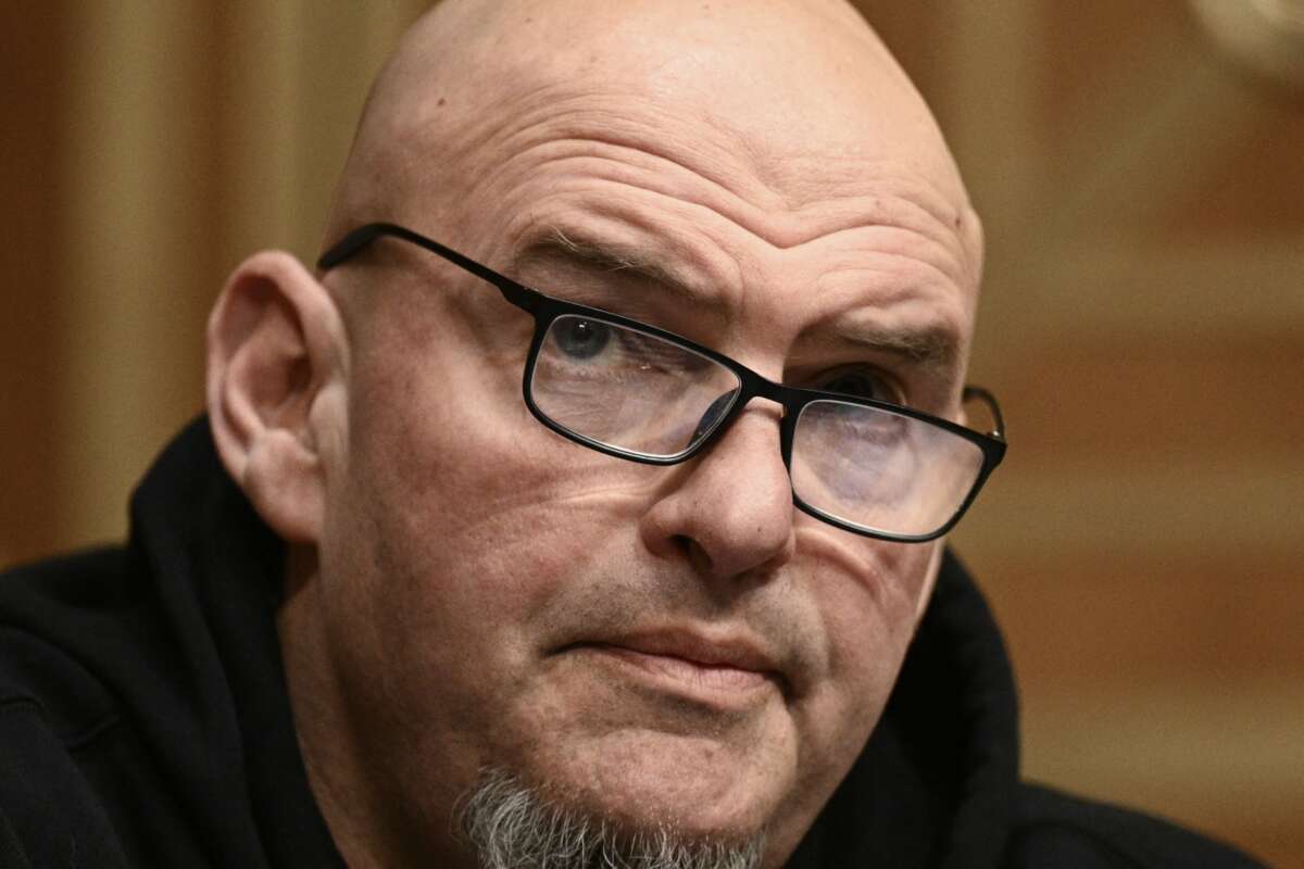 Sen. John Fetterman talks during a Senate Homeland Security and Governmental Affairs Committee hearing amid scrutiny over immigration enforcement on February 12, 2026.