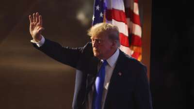 U.S. President Donald Trump waves as he departs after addressing attendees on the first day of the 2026 Republican National Convention at the American Airlines Center on September 9, 2026 in Dallas, Texas.