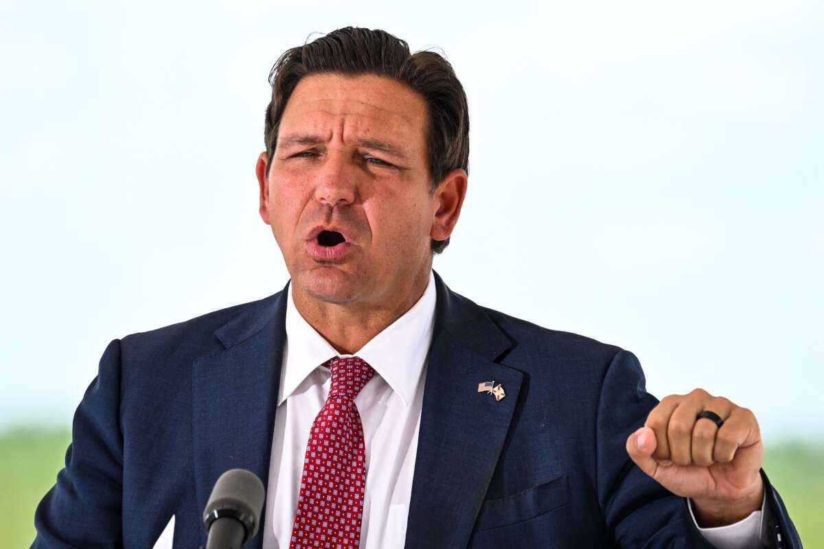 Florida Governor Ron DeSantis speaks during a press conference at the South Florida Detention Facility, nicknamed "Alligator Alcatraz," at the Dade-Collier Training and Transition Airport in Ochopee, Florida, on June 25, 2026.