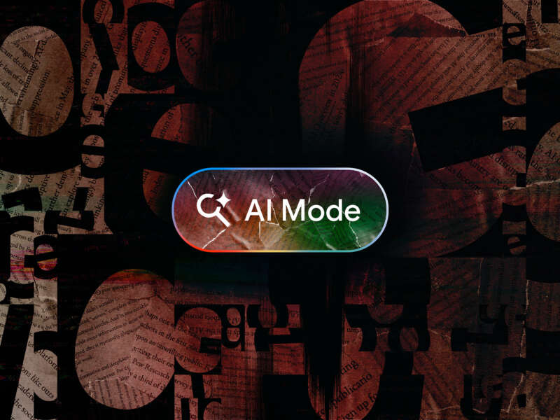 A cracked button with the text "AI Mode" inside over a background of random letters and clipped pieces of paper.