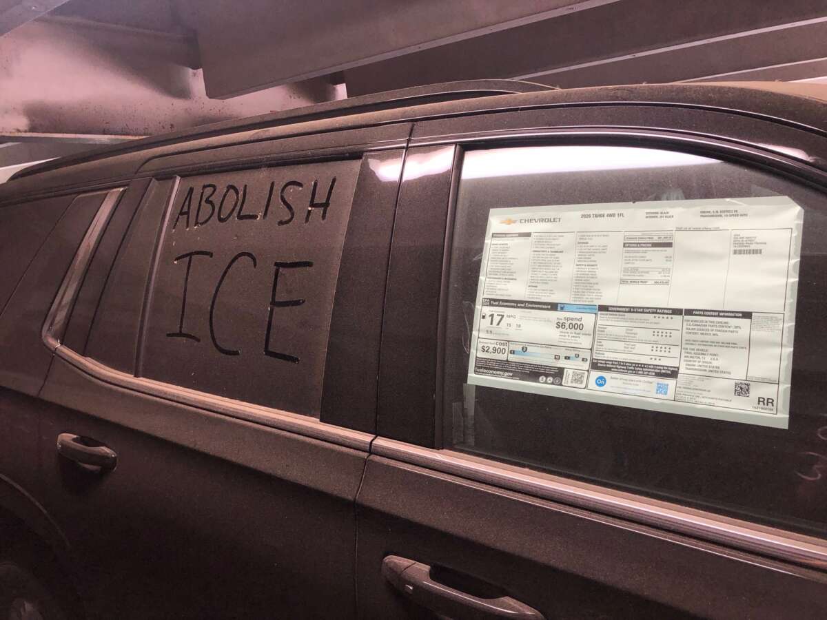 On August 5, Boston University professor Nathan Phillips wrote “Abolish ICE” in the dust of a vehicle parked in the National Development lot in Burlington, Massachusetts.