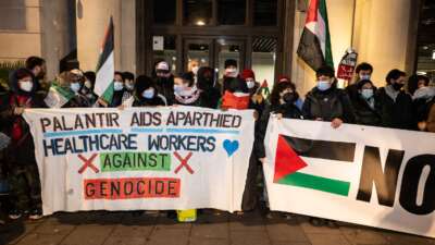 Health Workers for a Free Palestine picket military intelligence company Palantir on December 21, 2023 in London, England.