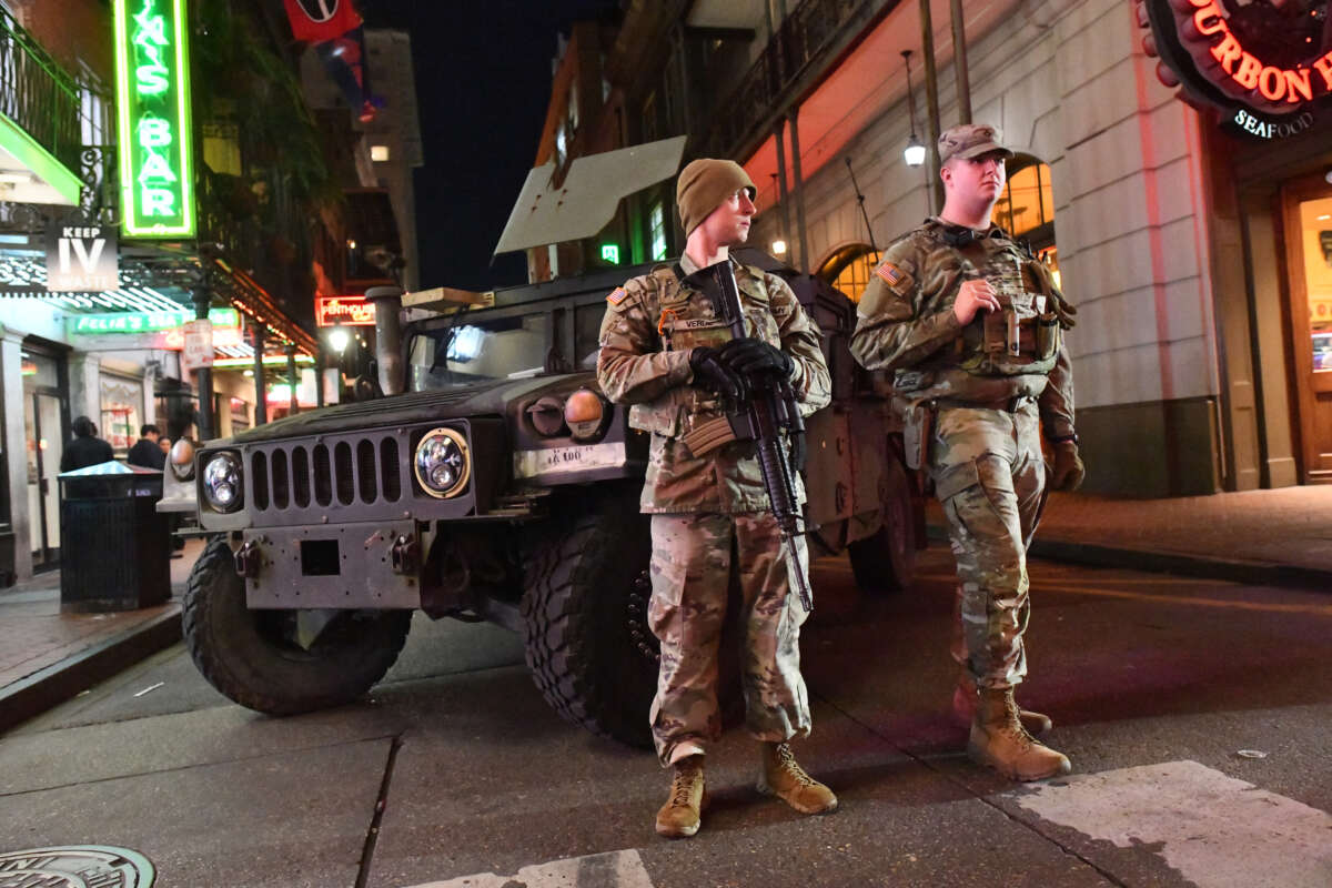 Members of the Louisiana National Guard stand watch in the French Quarter in New Orleans, Louisiana, on January 2, 2026.