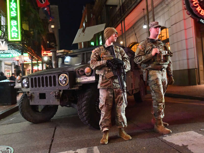 Members of the Louisiana National Guard stand watch in the French Quarter in New Orleans, Louisiana, on January 2, 2026.