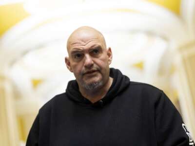 Sen. John Fetterman speaks to reporters on January 29, 2026, in Washington, D.C.