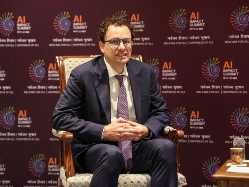 Anthropic CEO Dario Amodei looks on during a meeting with France's President Emmanuel Macron on the sidelines of the AI Impact Summit in New Delhi, India, on February 19, 2026.