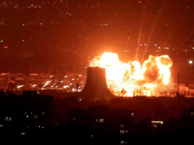 An explosion erupts following strikes near Azadi Tower close to Mehrabad International Airport in Tehran on March 7, 2026.