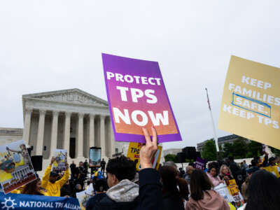 Temporary Protected Status holders along with union leaders and advocates rally as the Supreme Court prepares to hear oral arguments in Mullin v. Doe on April 29, 2026, in Washington, D.C.