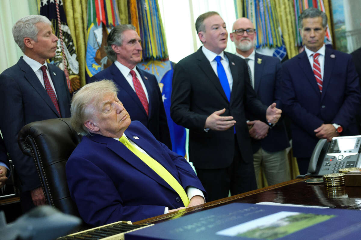 President Donald Trump listens as EPA administrator Lee Zeldin delivers remarks alongside and Secretary of Energy Chris Wright, Interior Secretary Doug Burgum, Rep. Derrick Van Orden, and Rep. Dan Meuser during a "Beautiful, Clean Coal" event hosted in the Oval Office of the White House on June 4, 2026, in Washington, D.C.