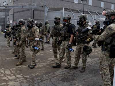 ICE agents outside the Delaney Hall immigration jail on June 27, 2026, in Newark, New Jersey.