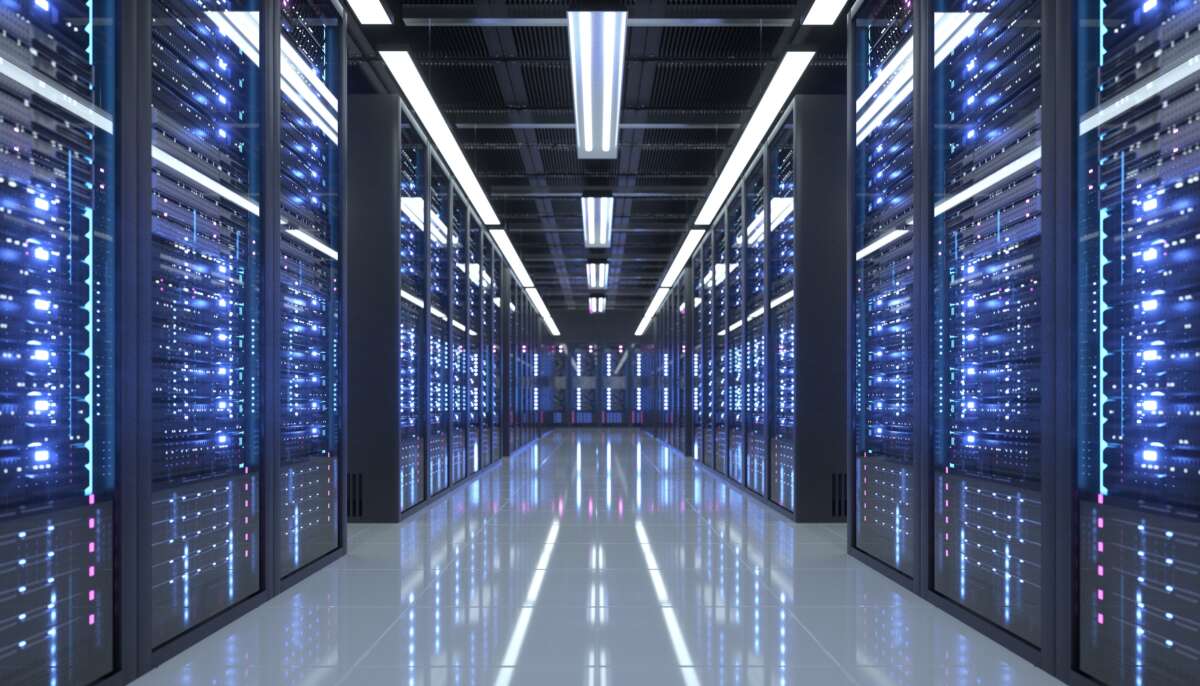A long corridor inside a modern data center.