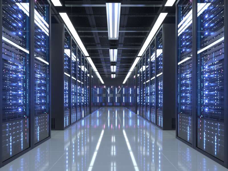 A long corridor inside a modern data center.