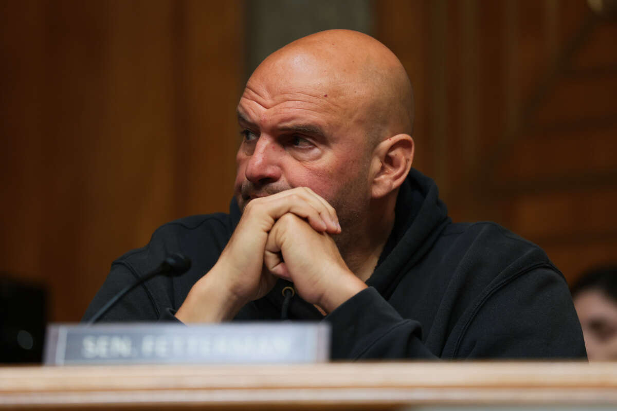 U.S. Sen. John Fetterman looks on during a business meeting with the Senate Homeland Security and Government Affairs Committee in the Dirksen Senate Office Building on August 6, 2026, in Washington, D.C.