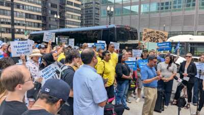 Demonstrators participate in a public transit rally on June 26, 2025, with the Illinois Clean Jobs Coalition and the Labor Alliance for Public Transit.